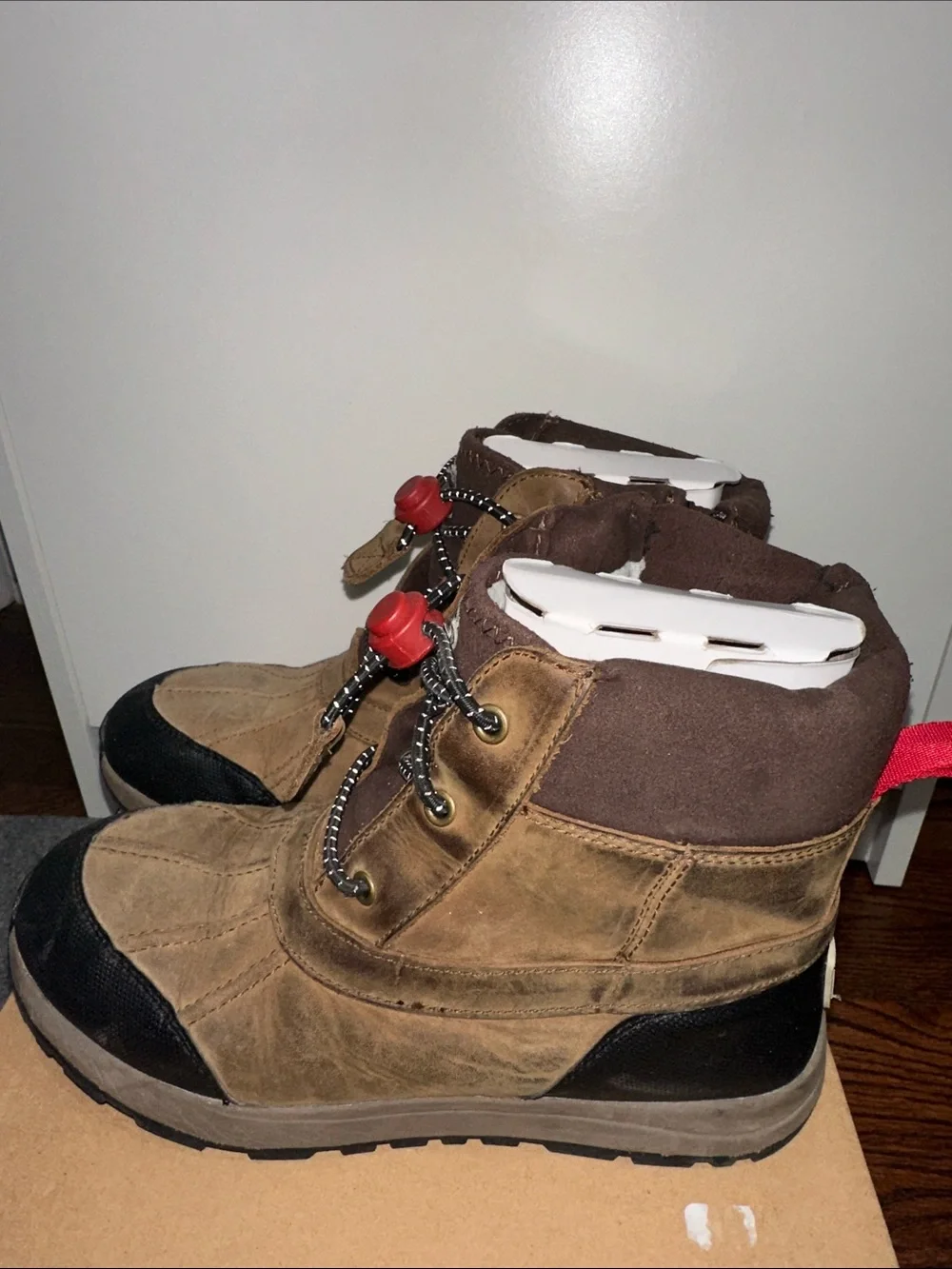UGG Kids Brown and Black Winter Boots with Red Toggle